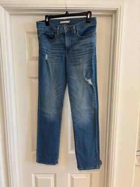 LEVI’s Women’s Blue Distressed 314 SHAPING STRAIGHT leg. Size 30